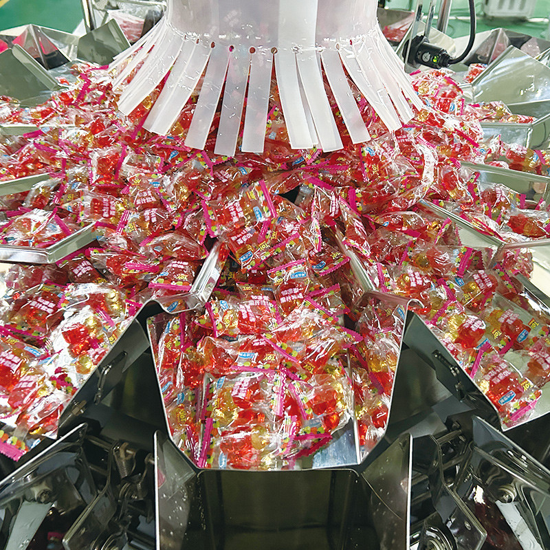 Fully Automatic High Speed Nitrogen Vertical Form Fill Seal Pouch Snack Food Weighing Puffs Food Pellet Packing Machine